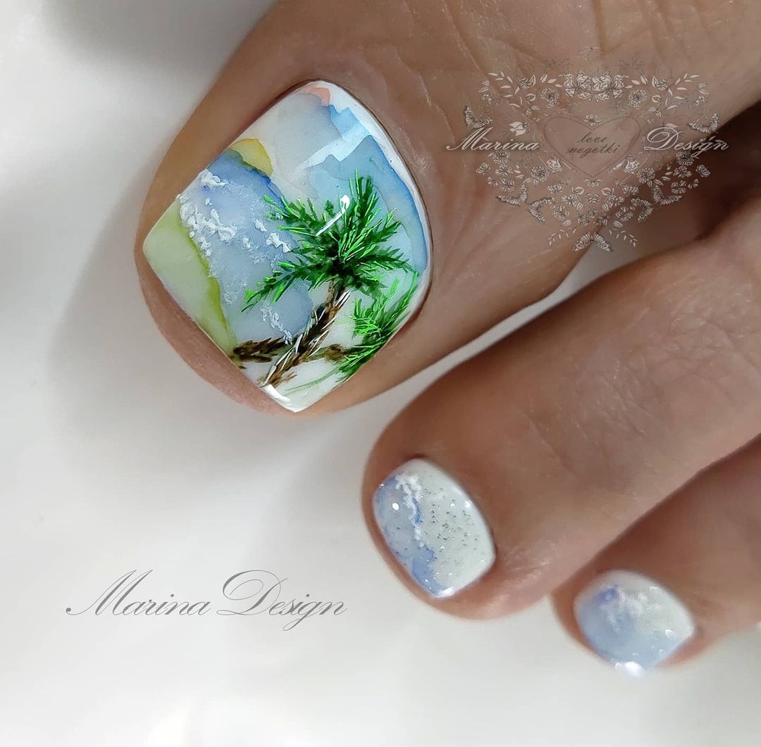 Witte teennagels met zee- en palmontwerp op grote nagels